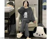 Black woolen nightwear pajama set with a kitty print, featuring long sleeves and a matching top and bottom. Made in India